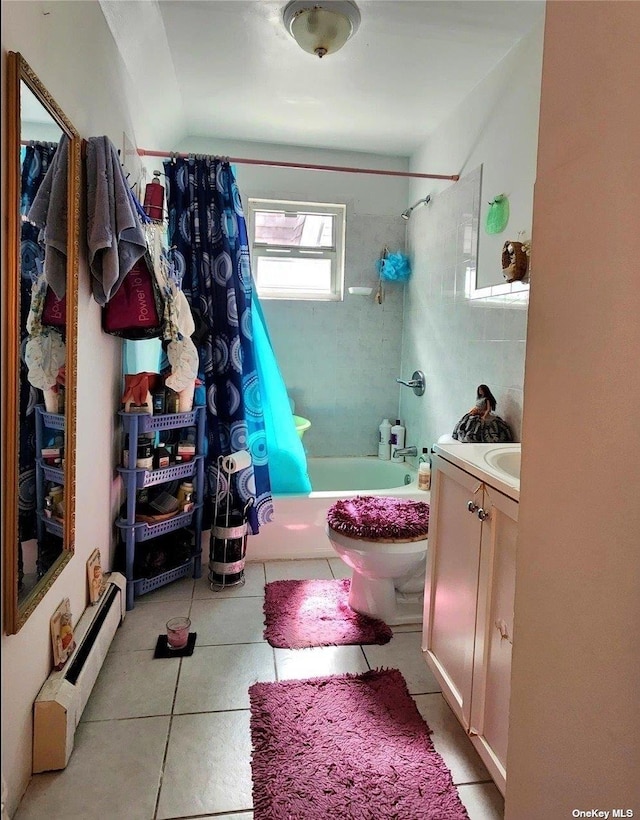 full bathroom with tile patterned flooring, vanity, a baseboard heating unit, toilet, and shower / bath combo with shower curtain