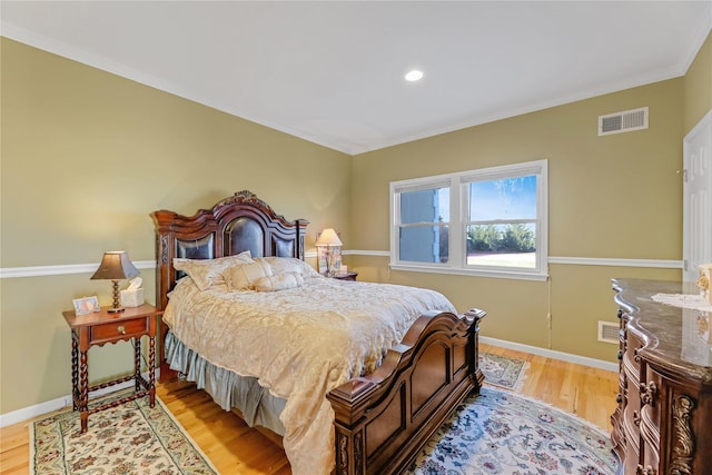 bedroom with light hardwood / wood-style flooring