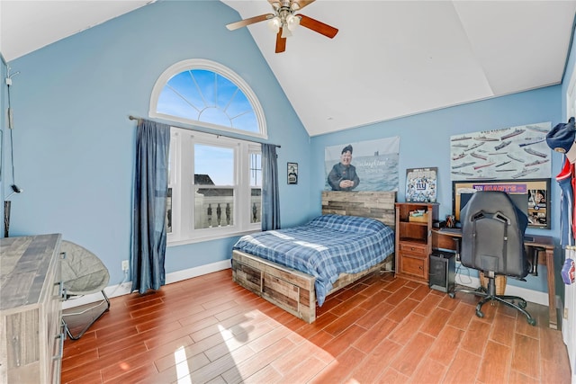 bedroom with high vaulted ceiling and ceiling fan