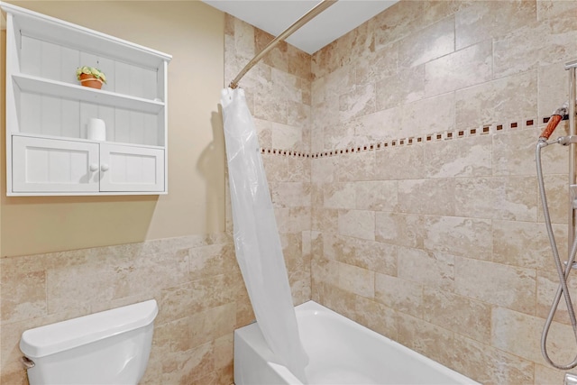 bathroom featuring shower / bath combo, tile walls, and toilet