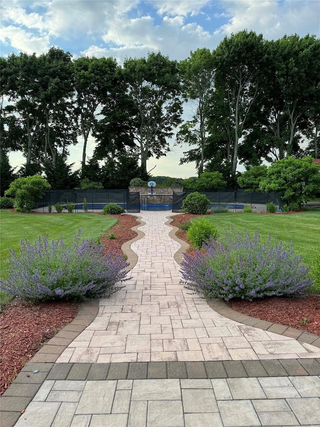 view of community with a lawn