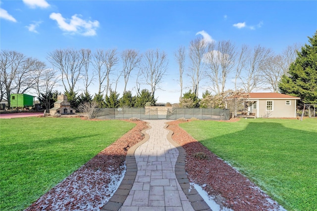 view of yard featuring a fireplace