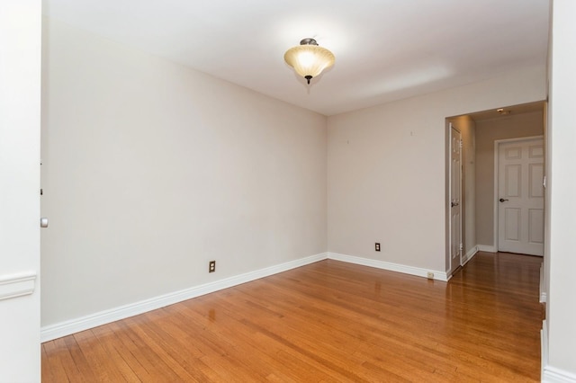 empty room featuring wood-type flooring