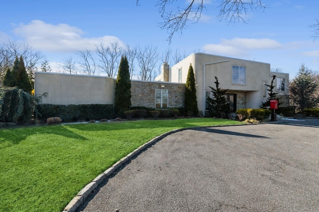 view of property exterior featuring a yard