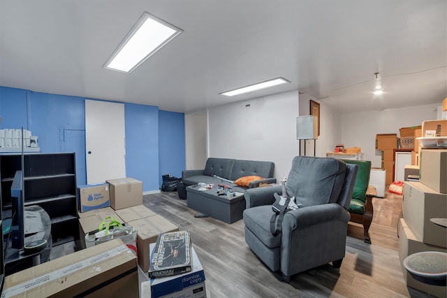 living room with light hardwood / wood-style flooring