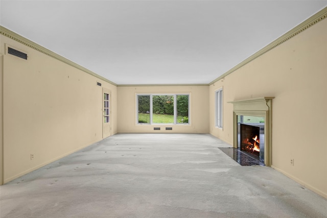 18 Kent Rd, Scarsdale, NY 10583 - unfurnished living room with light colored carpet, a fireplace with flush hearth, and crown molding