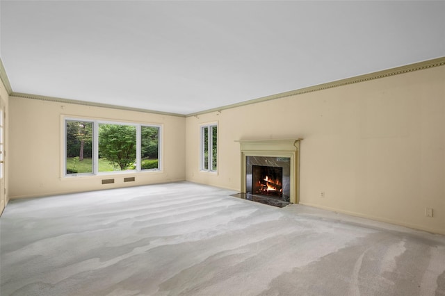 18 Kent Rd, Scarsdale, NY 10583 - unfurnished living room with carpet flooring, a fireplace, and ornamental molding