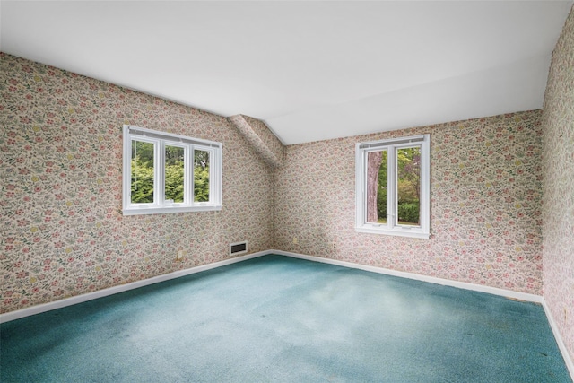 18 Kent Rd, Scarsdale, NY 10583 - carpeted spare room featuring plenty of natural light and vaulted ceiling