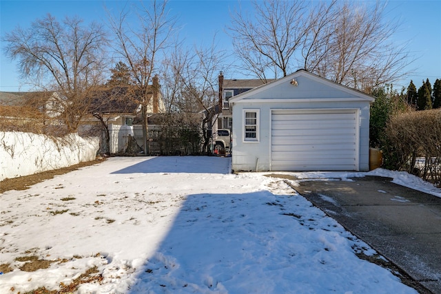 view of snow covered garage