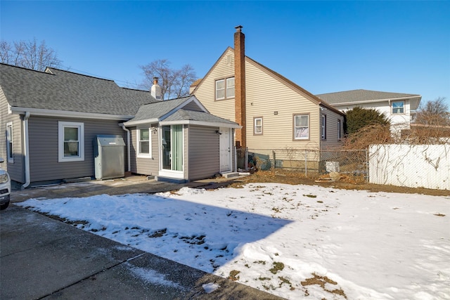 view of snow covered property