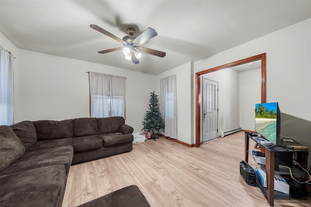 living room featuring a baseboard radiator, ceiling fan, and light hardwood / wood-style floors