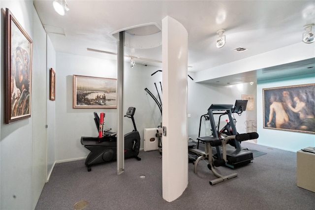 exercise room with carpet floors