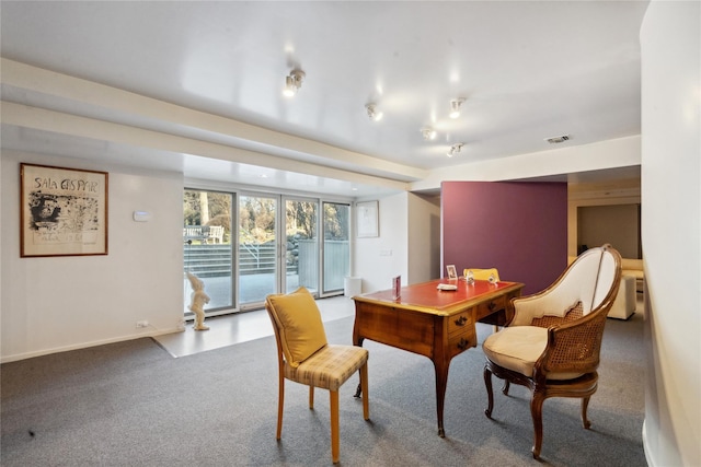 dining space with carpet flooring