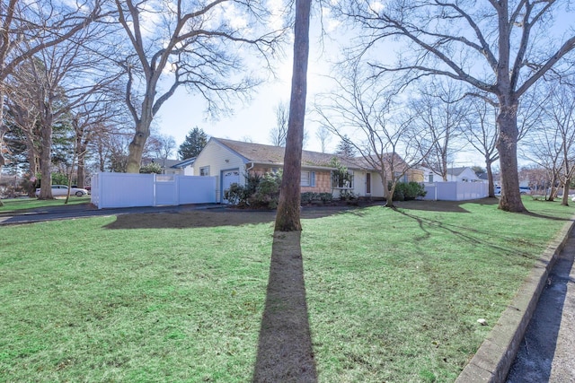 view of yard featuring a garage