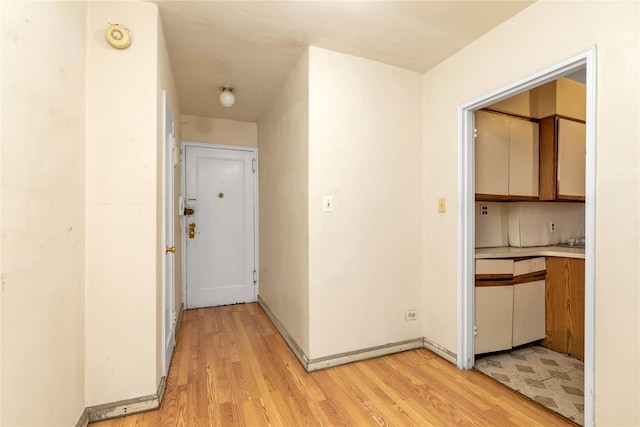 hall featuring light hardwood / wood-style floors