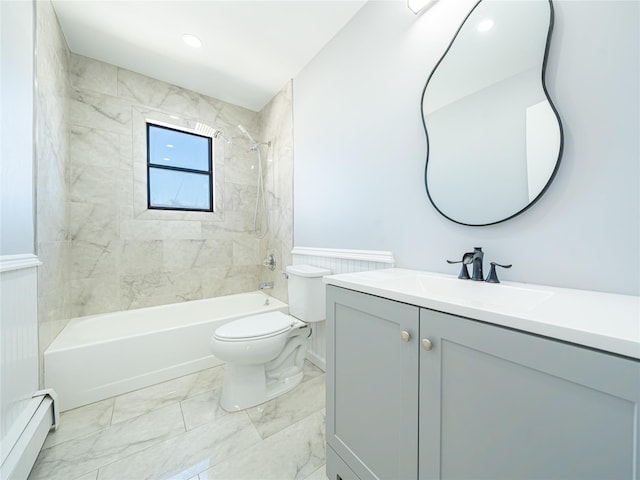 full bathroom featuring a baseboard radiator, toilet, vanity, and tiled shower / bath