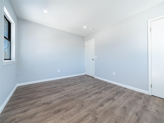 empty room featuring hardwood / wood-style floors