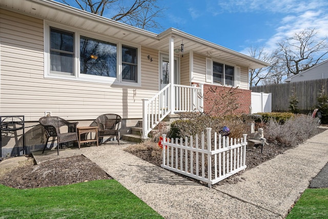 view of front of property with fence