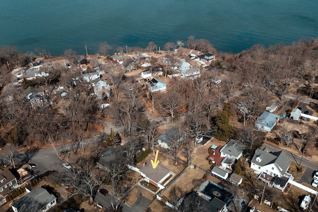 aerial view with a residential view and a water view