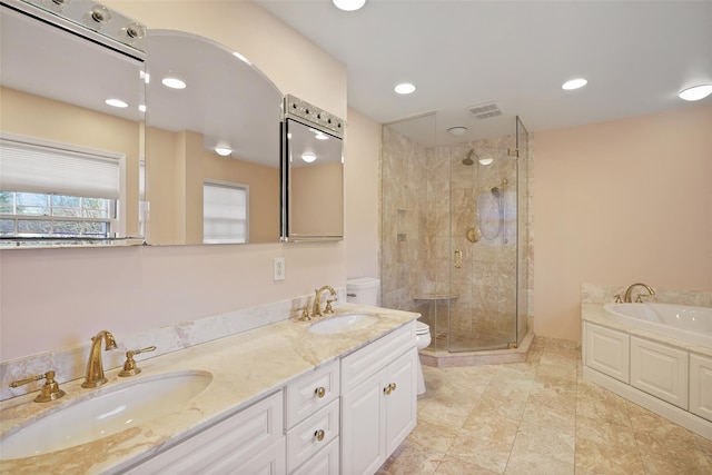 full bathroom featuring vanity, plus walk in shower, and toilet