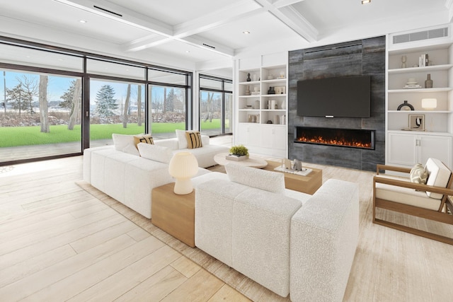 living room featuring built in shelves, coffered ceiling, light wood-type flooring, beamed ceiling, and a fireplace