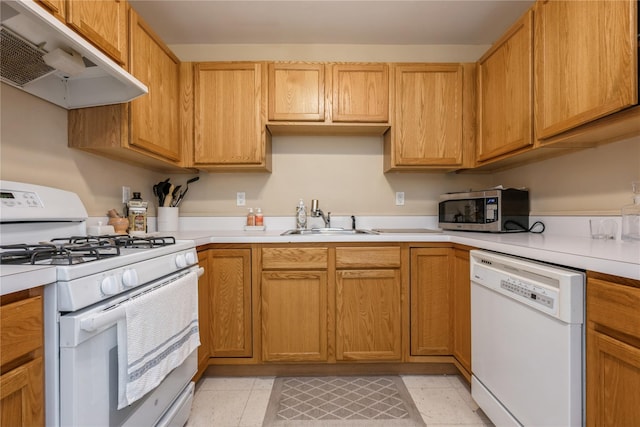 kitchen with white appliances and sink