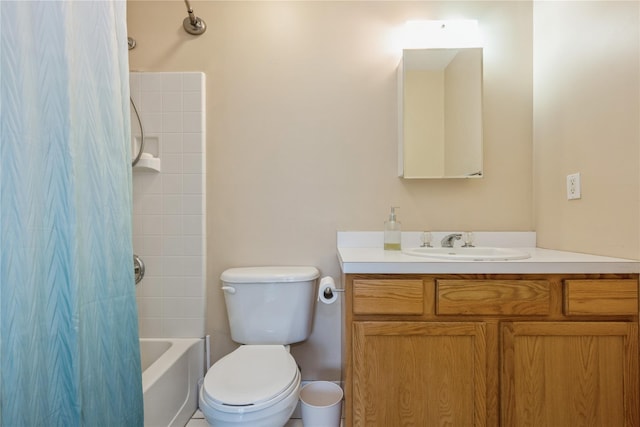 full bathroom featuring vanity, toilet, and shower / bath combo with shower curtain