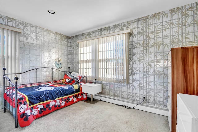 carpeted bedroom featuring a baseboard radiator