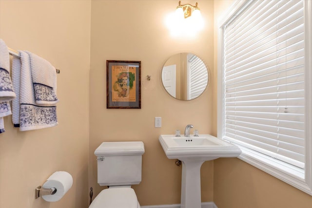 bathroom featuring toilet