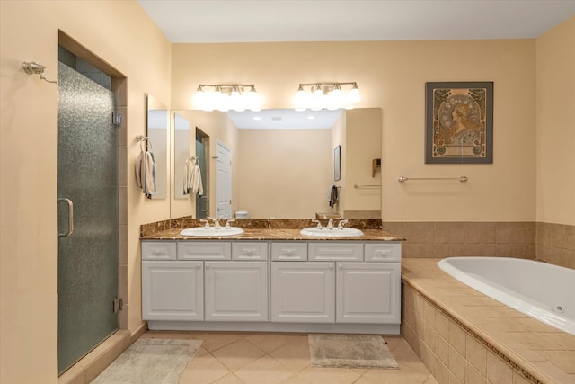 bathroom with tile patterned floors, plus walk in shower, and vanity