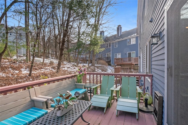 view of snow covered deck