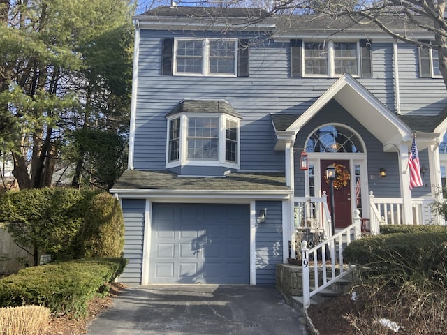 view of front of property featuring a garage