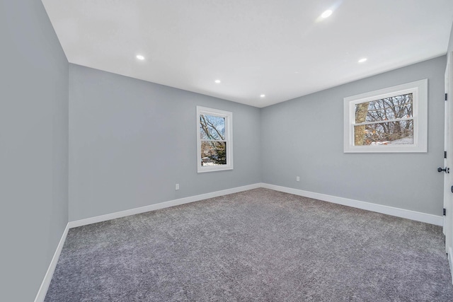 spare room featuring carpet flooring