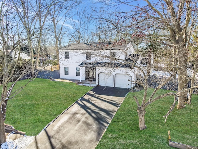 view of front facade featuring a garage and a front yard