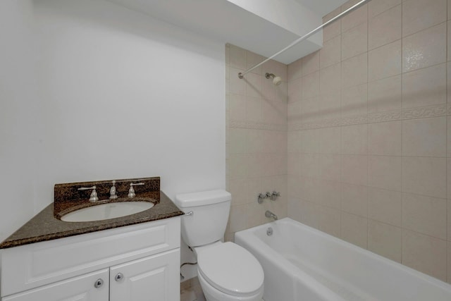 full bathroom with vanity, toilet, and tiled shower / bath combo