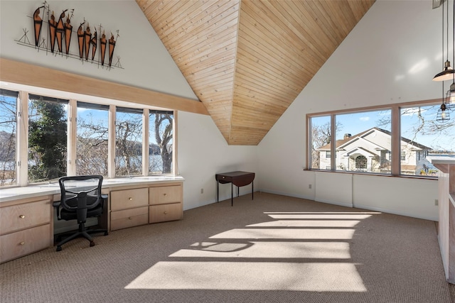 office featuring light carpet, wood ceiling, and plenty of natural light