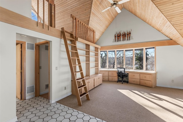 unfurnished office with high vaulted ceiling, wooden ceiling, ceiling fan, and dark colored carpet