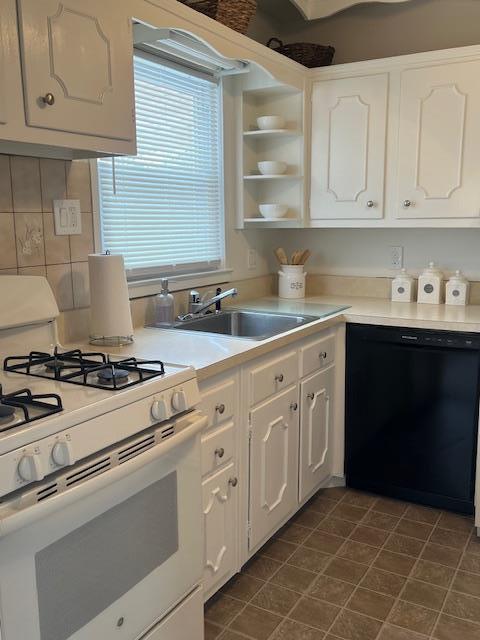 kitchen with white cabinetry, sink, white range with gas stovetop, and black dishwasher