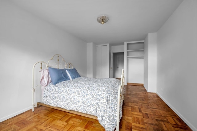 bedroom featuring parquet floors