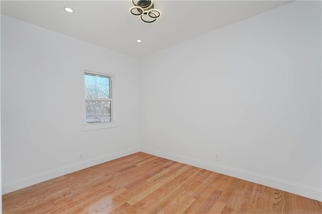 spare room with light wood-type flooring