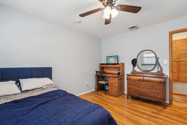 bedroom with ceiling fan and light wood-type flooring