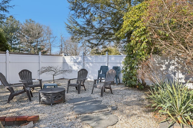 view of patio / terrace with an outdoor fire pit