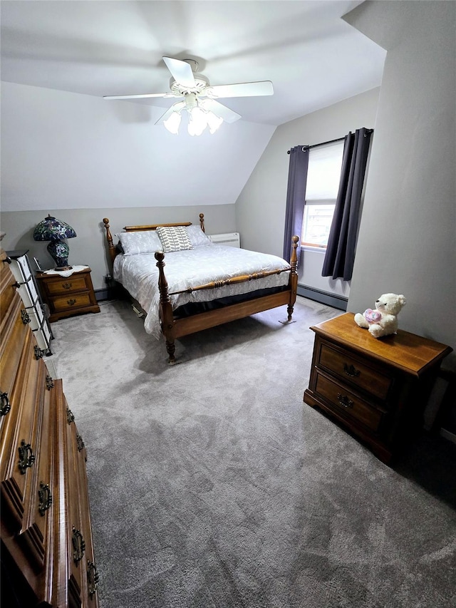 bedroom featuring ceiling fan, carpet flooring, vaulted ceiling, and a baseboard heating unit