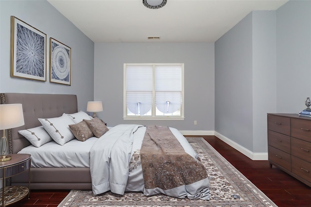 bedroom featuring dark wood-type flooring