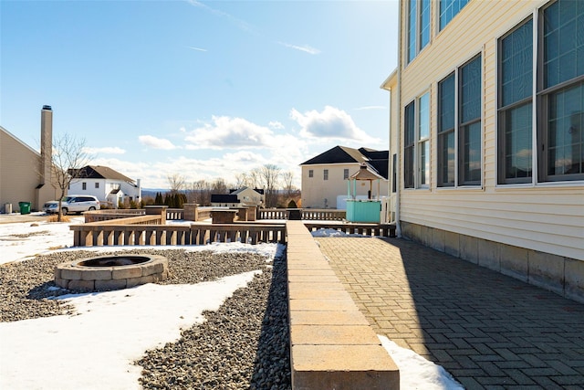 view of patio with a fire pit