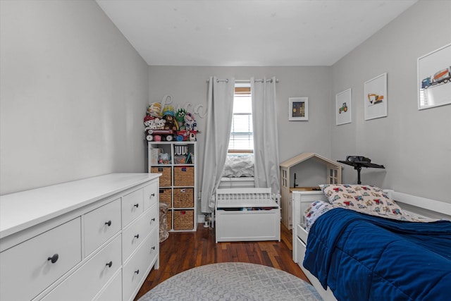 bedroom featuring dark hardwood / wood-style floors