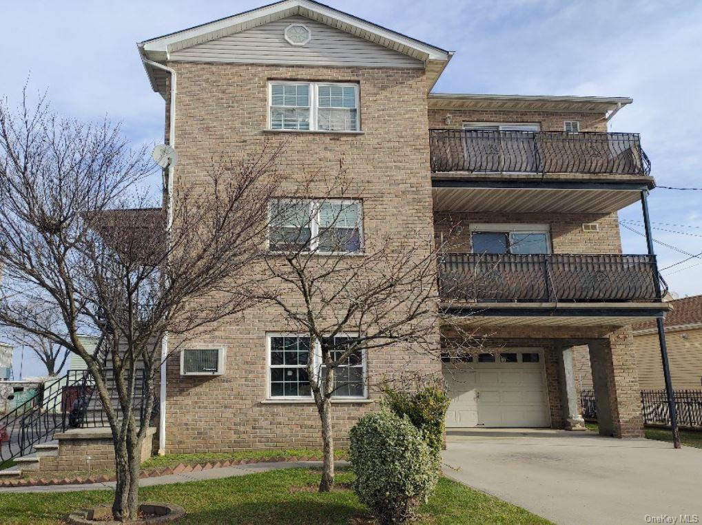 view of property with a garage