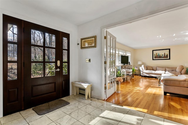 foyer entrance featuring a wealth of natural light