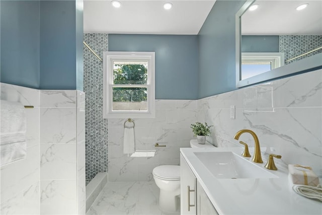 full bathroom with recessed lighting, tiled shower, toilet, and marble finish floor