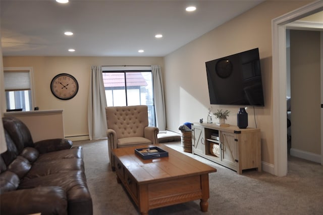 living room featuring carpet and baseboard heating